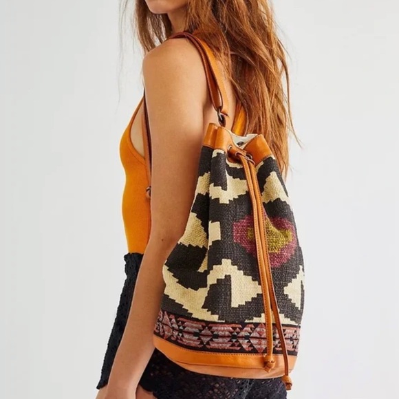 Free People Handbags - FREE PEOPLE Summer Days Sling Desert Sunrise